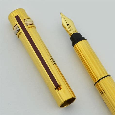 cartier trinity fountain pen.